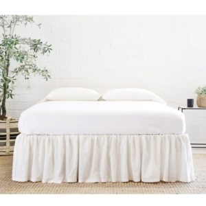 Gathered Linen Bed Skirt on Decking by Pom Pom at Home Gathered Linen Bed Skirt on Decking by Pom Pom at Home