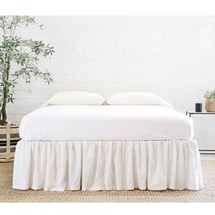 Gathered Linen Bed Skirt on Decking by Pom Pom at Home
