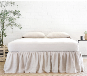 Gathered Linen Bed Skirt on Decking by Pom Pom at Home Gathered Linen Bed Skirt on Decking by Pom Pom at Home