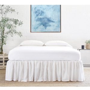 Gathered Linen Bed Skirt on Decking by Pom Pom at Home Gathered Linen Bed Skirt on Decking by Pom Pom at Home